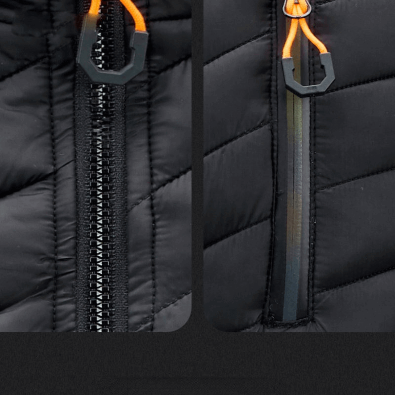 Close-up of black stylish sports vest zippers with orange accents, highlighting design details and high-quality nylon material.
